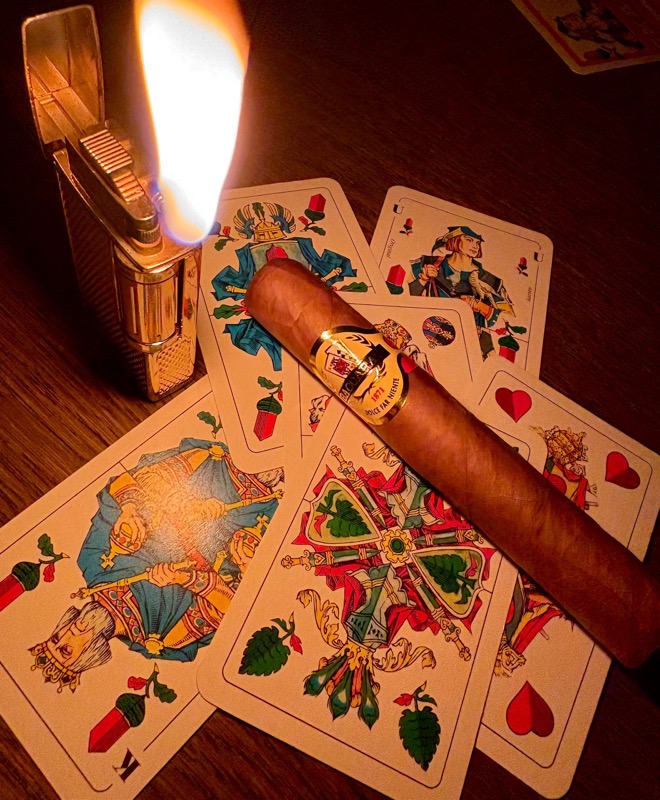 Baccarat 1871 Dolce Far Niente cigar with signature sweetened cap and gold band