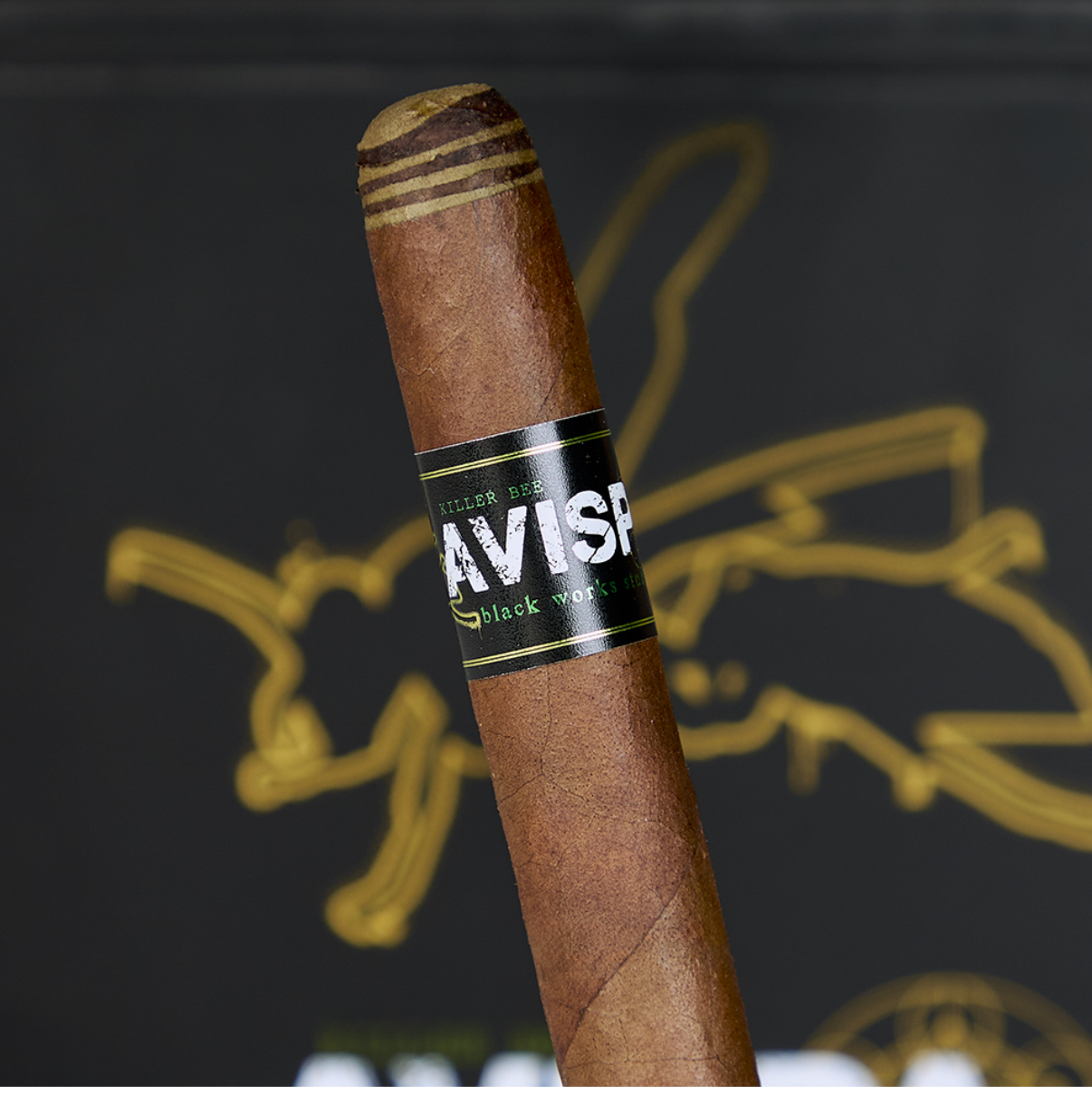 Black Works Studio Avispa boutique vitola with barber pole candela cap